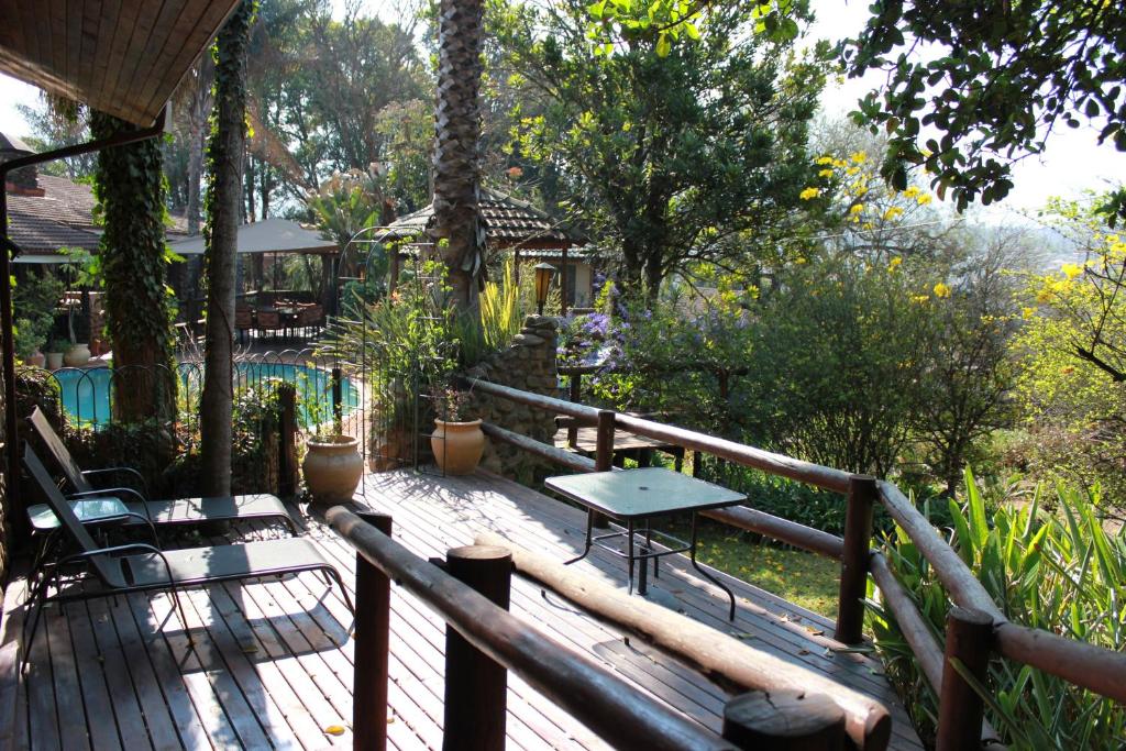 A comfortable and welcoming guest room at Sabie Town House Guest Lodge.